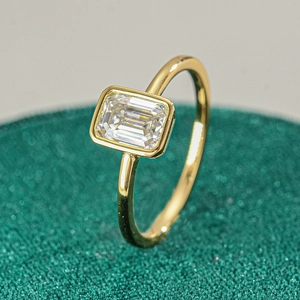 Classic S925 silver ring with 18k gold plating and emerald cut moissanite in bezel setting