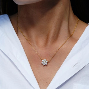 S925 silver sunflower necklace with 1 carat moissanite stones on a gold chain
