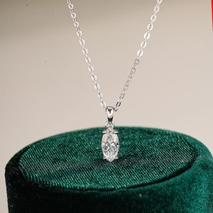 Marquise cut 1 carat moissanite pendant in 925 sterling silver on dark green velvet box
