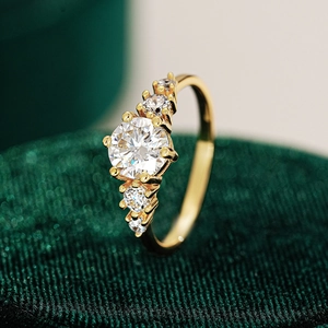French style 925 sterling silver gold-plated ring with moissanite five-stone design