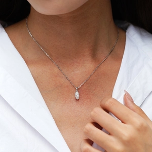 Marquise-cut moissanite pendant necklace in 925 sterling silver on a female model