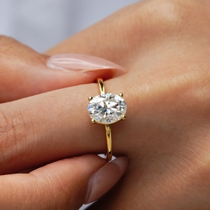 Bague de luxe en argent S925 plaqué or 18K avec moissanite ovale et serti à quatre griffes