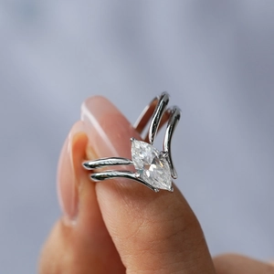 Elegant S925 silver ring featuring a marquise-cut moissanite with double V-shape band