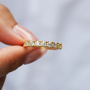 Classic S925 silver ring with gold plating and nine round moissanite stones in row setting