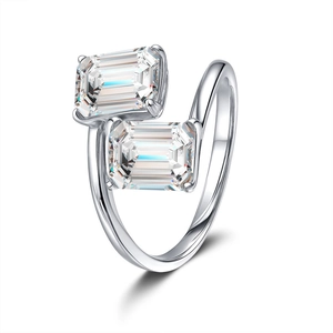 S925 silver emerald cut moissanite bypass ring with two main stones on white background