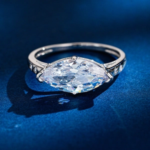 Elegant s925 silver ring featuring marquise-cut moissanite and side diamond accents