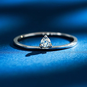 Minimalist S925 sterling silver ring with a round brilliant moissanite in three-prong setting