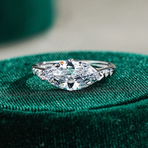 Macro close-up of a marquise-cut moissanite diamond ring on s925 silver band
