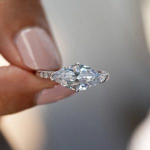 Classic S925 silver ring with a marquise-cut moissanite stone shown on a hand