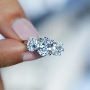 S925 sterling silver ring with three oval-cut moissanite stones in a classic six-prong setting