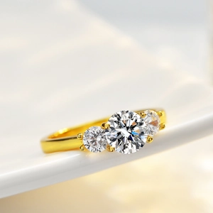 Classic 14K gold plated S925 silver three-stone moissanite ring with a 1ct round center stone