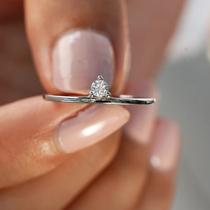 Minimalist S925 sterling silver ring with brilliant round moissanite in three-prong setting