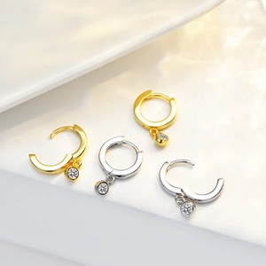Elegant s925 silver hoop earrings with round moissanite charms in gold and silver finish
