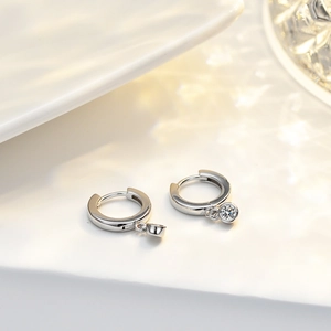 Elegant S925 silver huggie hoop earrings with round Moissanite pendants in 14K gold plating