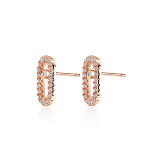 Rose gold oval stud earrings with pavé set moissanite stones in a minimalist design