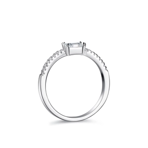 S925 sterling silver ring with emerald-cut moissanite and pave accents on white background