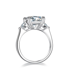 Classic S925 silver ring featuring a large round moissanite with three-stone setting
