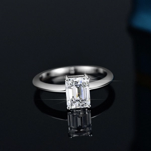 S925 sterling silver ring with 2 carat emerald cut moissanite on black reflective base
