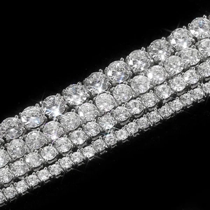 Macro view of tiered S925 sterling silver moissanite tennis chains in four sizes