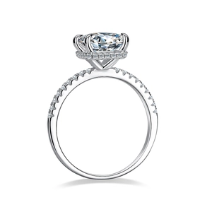 Exquisite S925 sterling silver ring featuring a 4-carat moissanite halo and pavé band