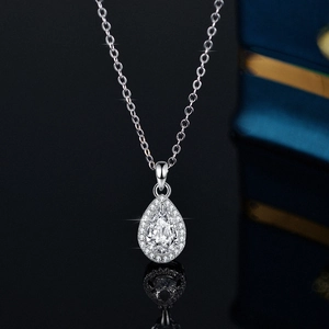 Elegant S925 sterling silver necklace with pear-cut moissanite pendant and halo diamonds