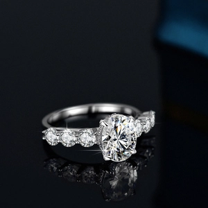 Oval cut moissanite engagement ring in S925 sterling silver with side stones