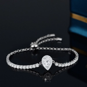 925 silver bracelet featuring a pear-cut moissanite stone and adjustable tennis chain