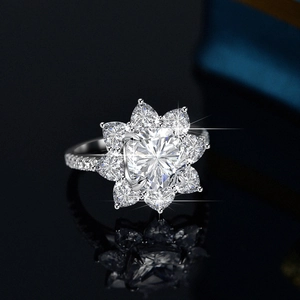 Sunflower design sterling silver ring with 3 carat moissanite and petal cut halo