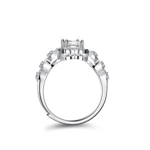 S925 silver ring featuring emerald-cut moissanite and twisted pavé diamond band