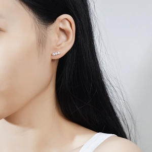 Elegant S925 sterling silver stud earrings with three-stone moissanite bar design