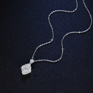 S925 sterling silver necklace with 1-carat oval moissanite in a floral crown pendant