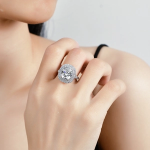 Luxury S925 silver ring with a 4-carat rectangle moissanite stone shown on model finger