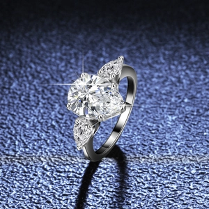 S925 sterling silver ring with 4 carat pear cut moissanite and three-stone setting