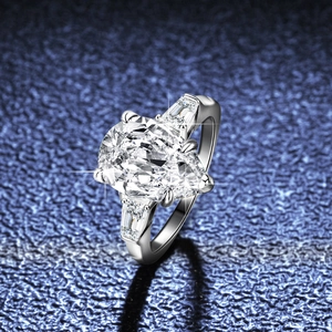Classic S925 silver engagement ring with a 4-carat pear shaped moissanite stone