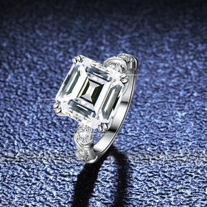 5 carat emerald cut moissanite ring in 925 sterling silver with sparkling accent stones