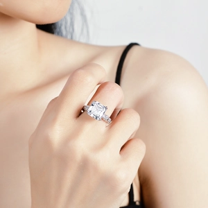 Luxury 5ct princess cut moissanite ring in sterling silver worn by a female model