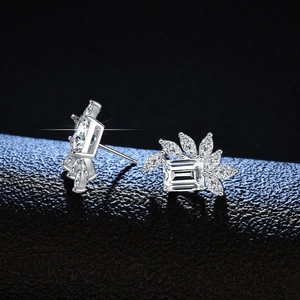 Elegant S925 silver stud earrings with rectangular emerald cut stone and leaf accent