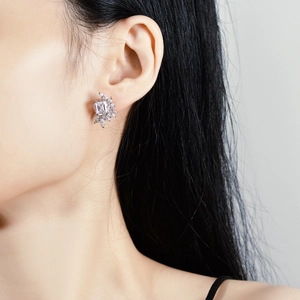 S925 silver stud earrings with emerald-cut zirconia in a floral cluster design