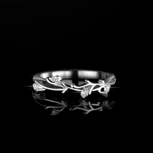Elegant twig style 925 sterling silver ring featuring four brilliant moissanite stones