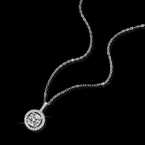 Elegant s925 silver necklace with 1-carat round moissanite halo pendant on a black background