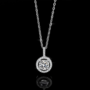 Classic S925 sterling silver halo necklace with 1 carat round moissanite on black reflection