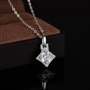 Elegant S925 sterling silver necklace with 1-carat moissanite pendant on luxury display