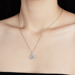 S925 Sterling Silver 1ct Moissanite Halo Pendant Necklace worn on a woman's collarbone