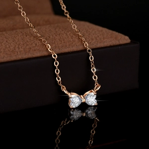 Collier en argent S925 or rose avec pendentif nœud et moissanite en forme de cœur