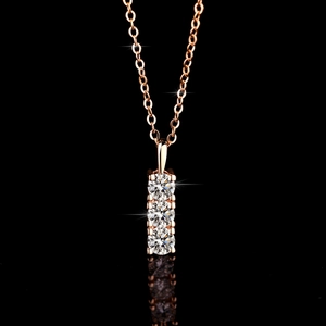 Elegant rose gold S925 silver necklace with three vertical moissanite stones on black mirror