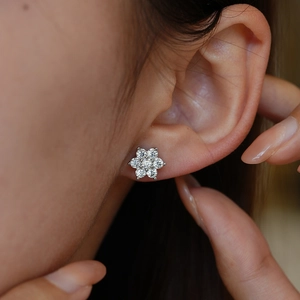 925 Sterling Silver Moissanite Flower Stud Earrings featuring a six-petal floral design