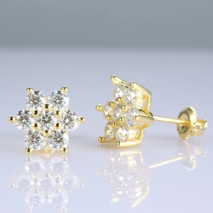 Close-up of 925 sterling silver moissanite flower studs with screw back posts