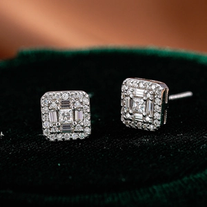Macro shot of S925 sterling silver square moissanite stud earrings with cluster setting