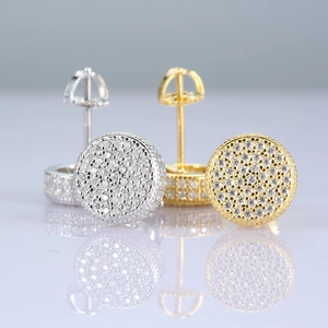 Macro detail of S925 sterling silver moissanite stud earrings with secure screw backs