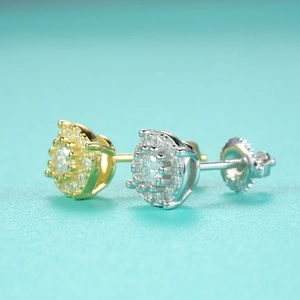 Detailed macro view of S925 sterling silver moissanite halo stud earrings with screw backs